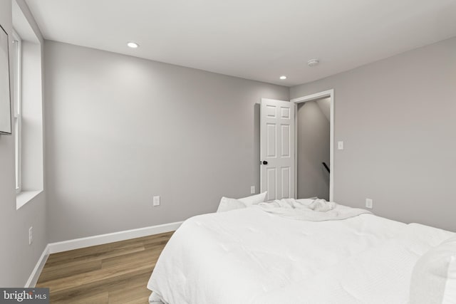 bedroom featuring wood-type flooring