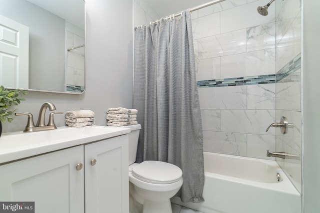 full bathroom featuring vanity, toilet, and shower / tub combo