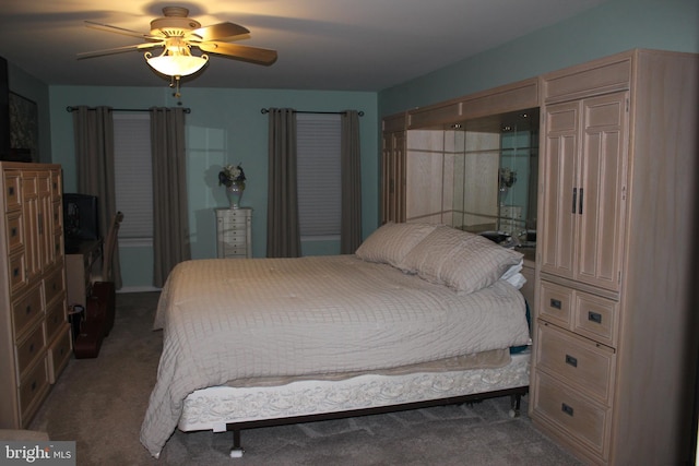 carpeted bedroom featuring ceiling fan