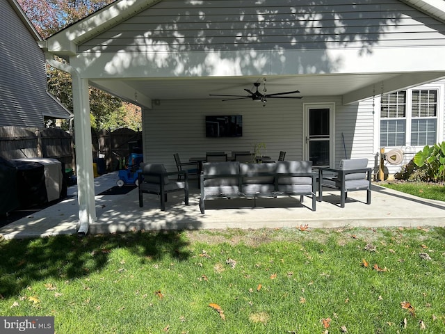 view of patio / terrace featuring an outdoor living space and ceiling fan