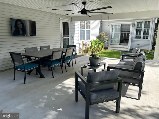 view of patio / terrace featuring ceiling fan and an outdoor living space