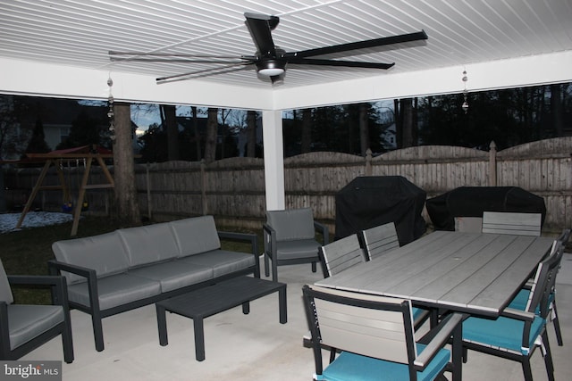 view of patio / terrace with an outdoor living space, grilling area, and ceiling fan