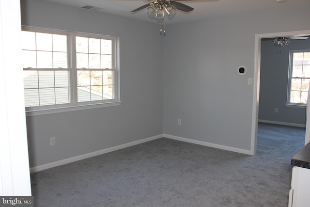 carpeted empty room with ceiling fan