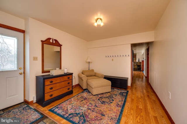 sitting room featuring hardwood / wood-style floors