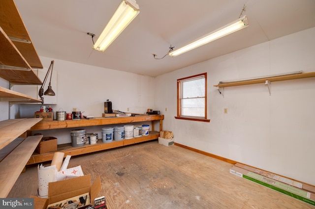 basement featuring hardwood / wood-style floors