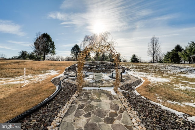 view of community with a rural view