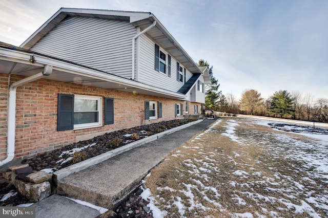 view of snow covered property