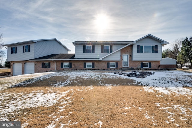 bi-level home featuring a garage