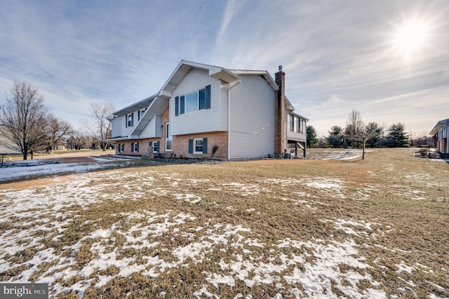 view of snow covered property