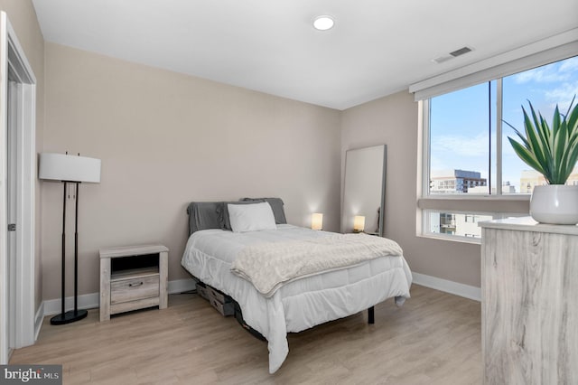 bedroom featuring light wood-type flooring