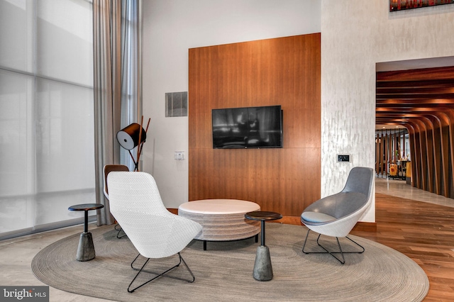 sitting room featuring hardwood / wood-style flooring