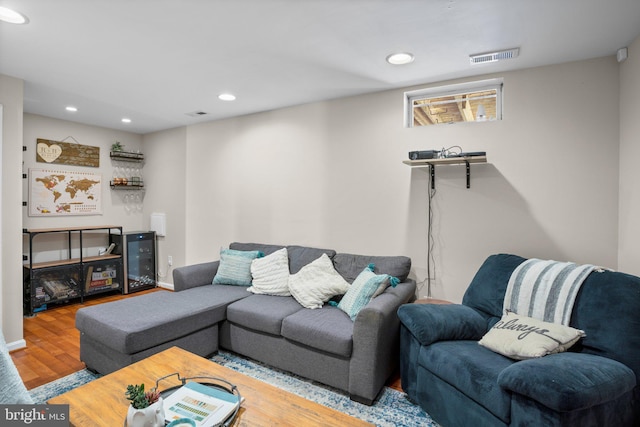 living room with hardwood / wood-style floors