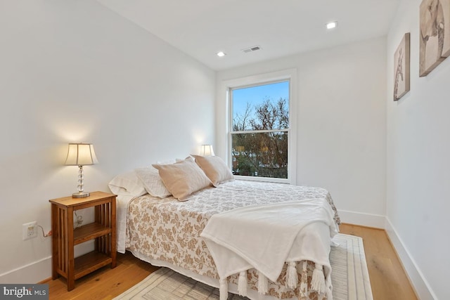 bedroom featuring hardwood / wood-style floors