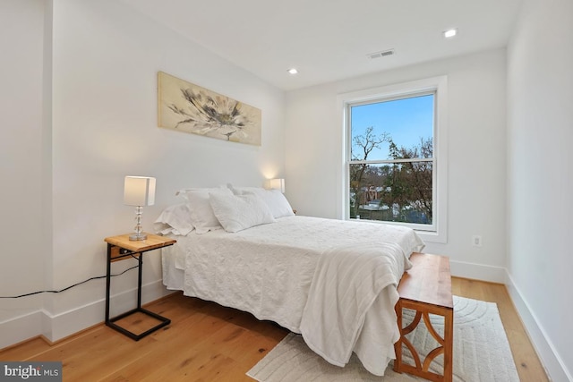 bedroom featuring hardwood / wood-style floors