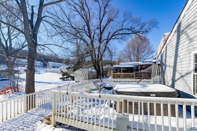 view of snow covered deck