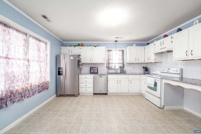 kitchen featuring crown molding, a textured ceiling, decorative light fixtures, white cabinetry, and stainless steel appliances