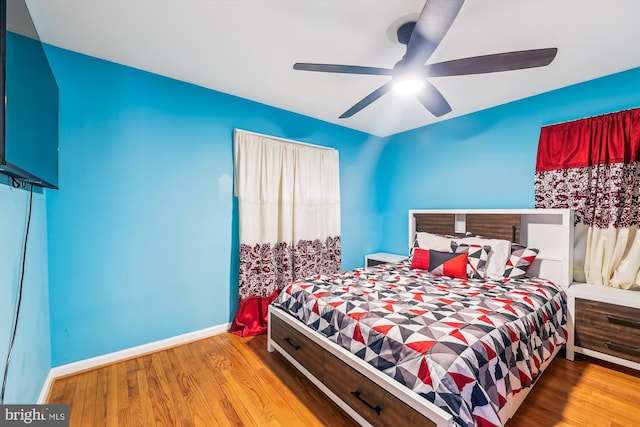 bedroom featuring ceiling fan and light wood-type flooring