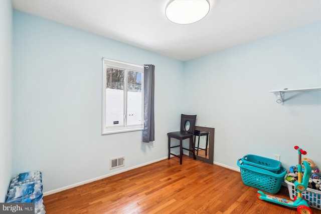 misc room with hardwood / wood-style floors