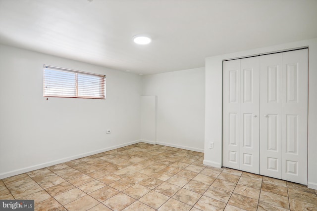 unfurnished bedroom featuring a closet