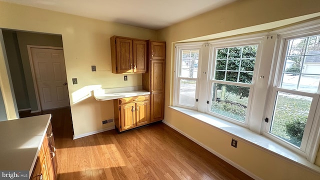 kitchen with light hardwood / wood-style flooring