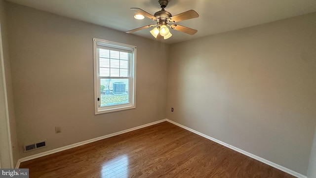 empty room with wood-type flooring and ceiling fan