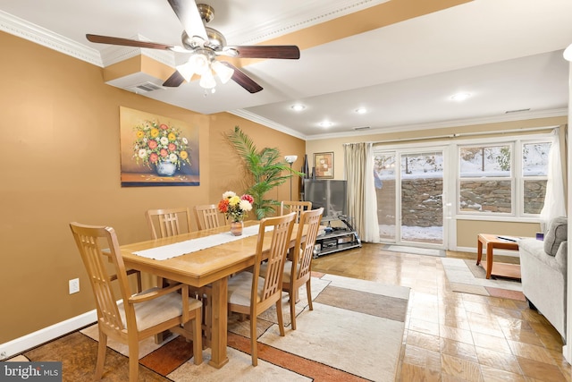 dining room featuring ceiling fan and ornamental molding