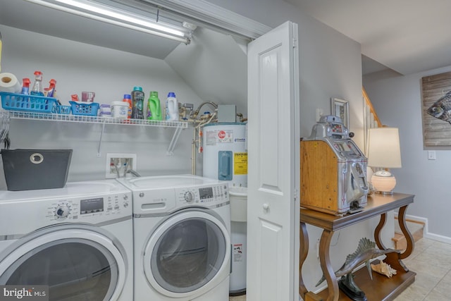 clothes washing area with electric water heater and washing machine and clothes dryer