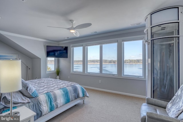 carpeted bedroom with ceiling fan and ornamental molding