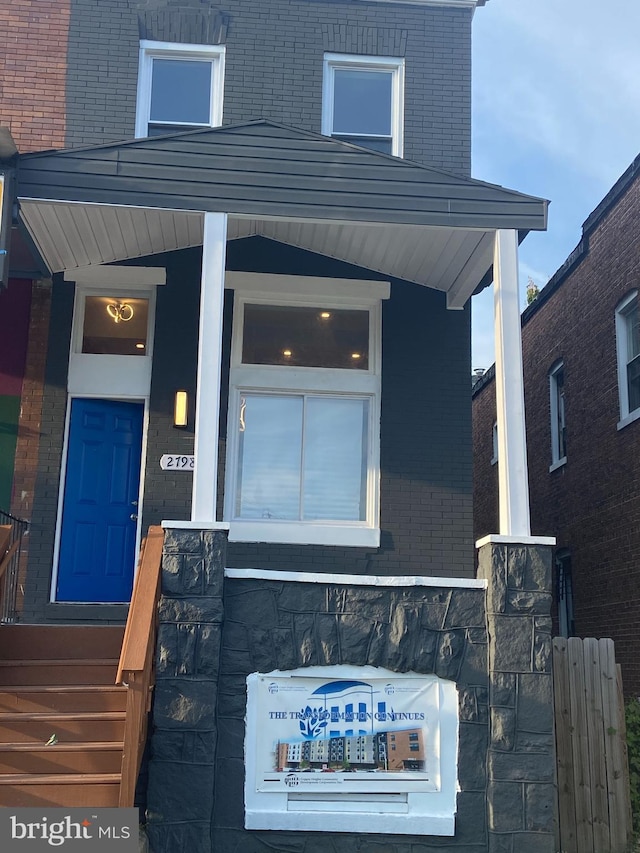 property entrance with a porch