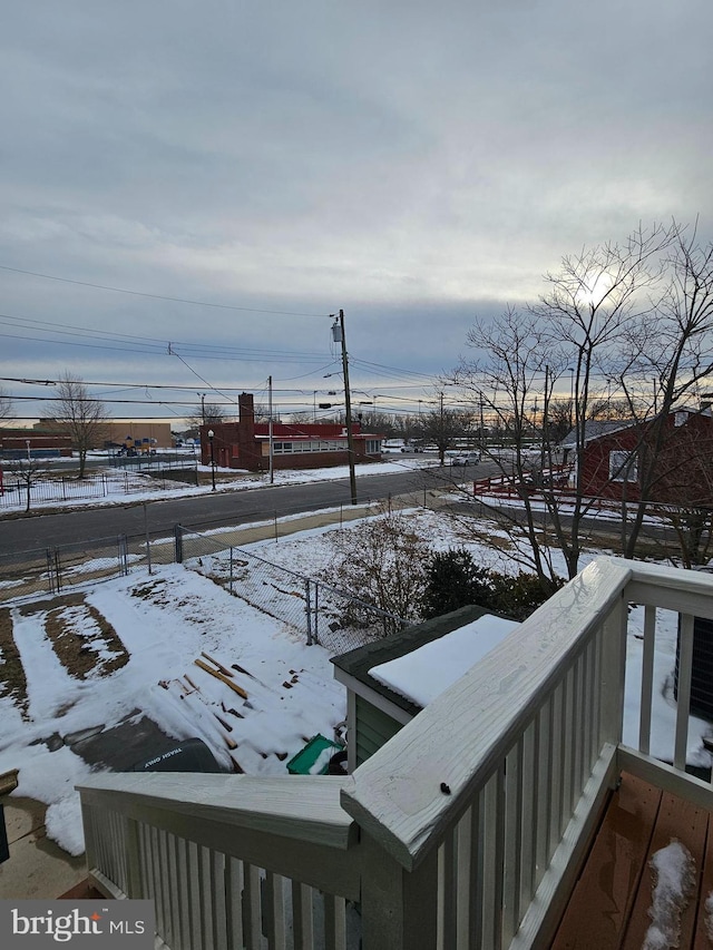 view of yard layered in snow