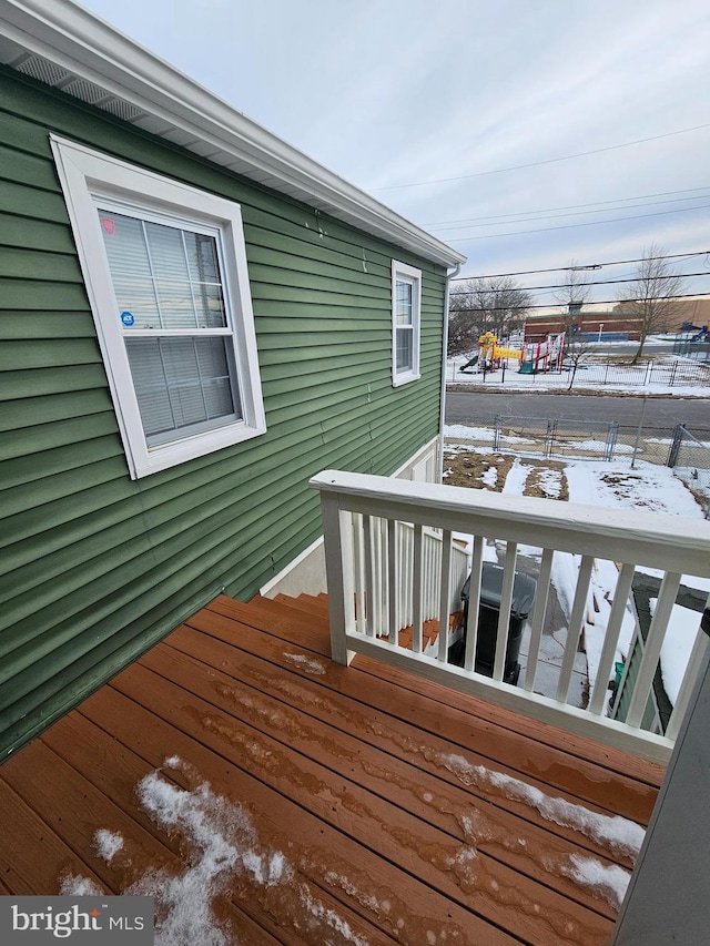 view of snow covered deck