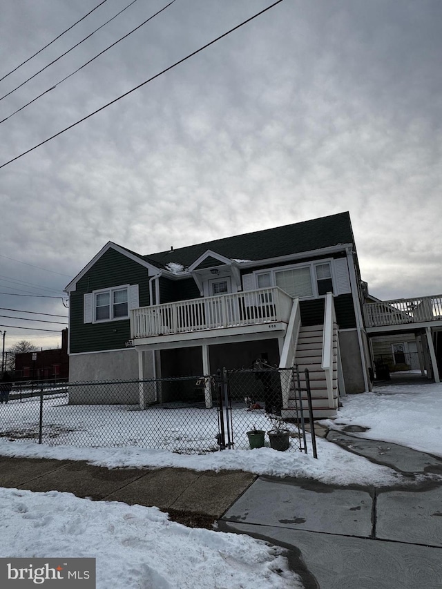 view of front of home with stairs