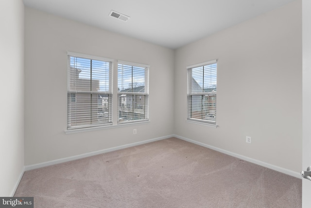 view of carpeted spare room