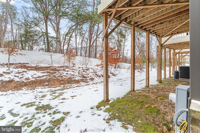 view of yard covered in snow