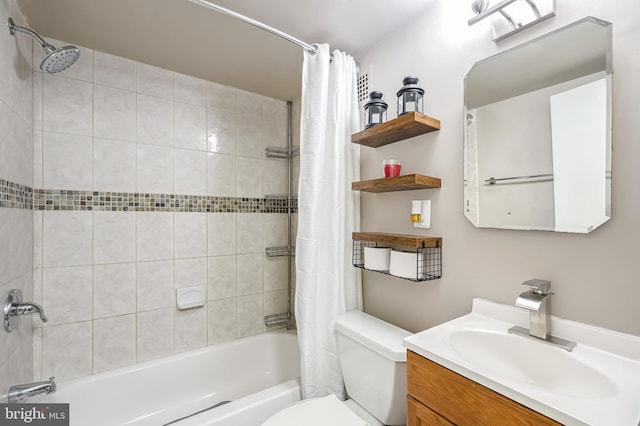 full bathroom featuring vanity, shower / bath combo, and toilet