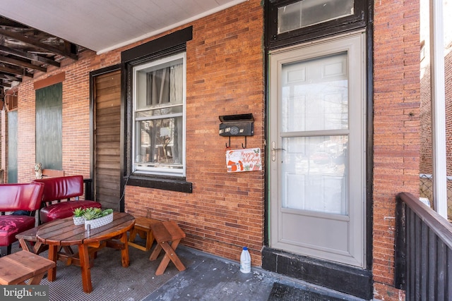 entrance to property with covered porch