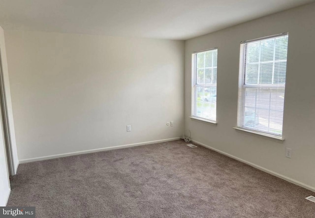 view of carpeted spare room