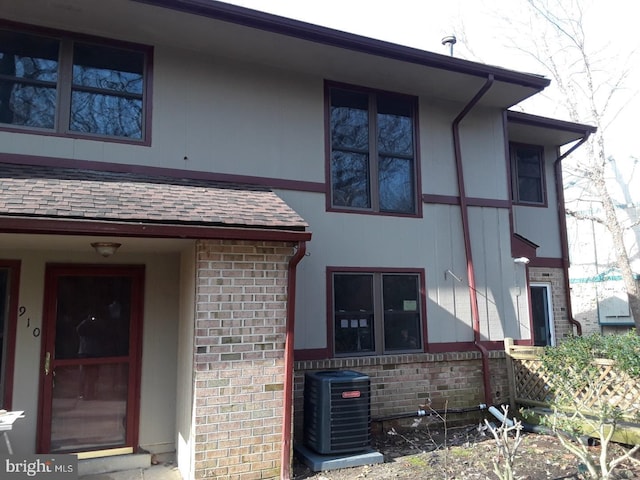 view of property exterior featuring central AC unit