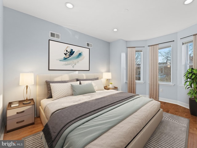 bedroom with light hardwood / wood-style floors