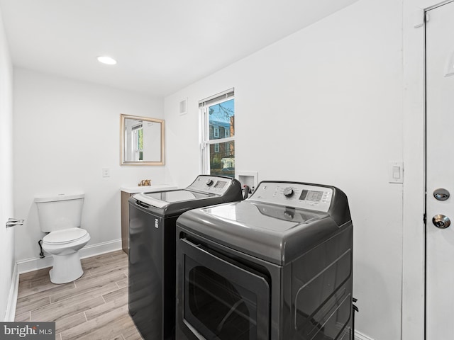 laundry area with washer and dryer