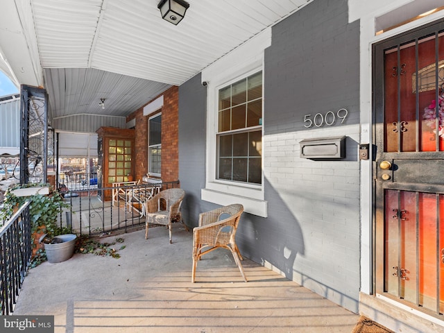 wooden terrace with covered porch