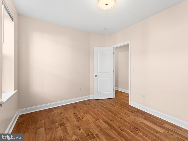 empty room with light wood-type flooring