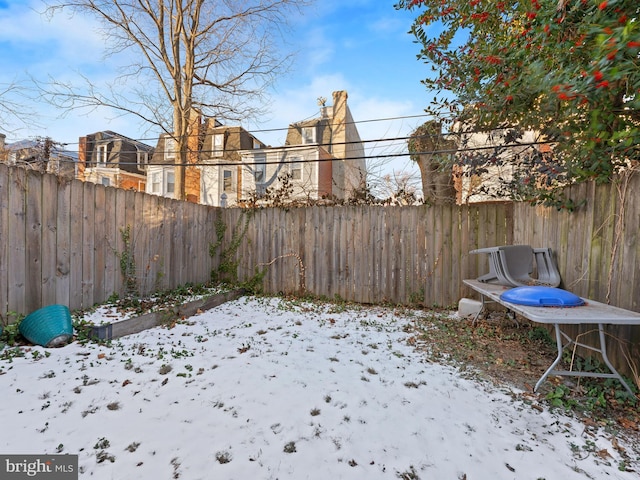 view of snowy yard