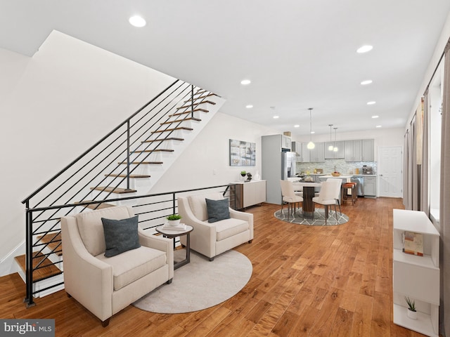 living room with light hardwood / wood-style floors