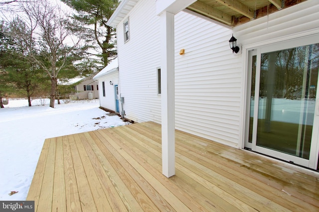 view of snow covered deck