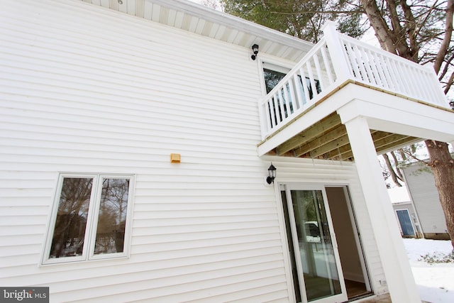 view of property exterior with a balcony