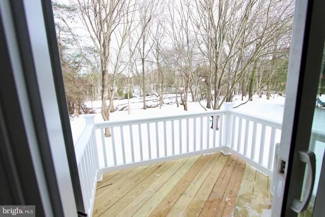 view of snow covered deck