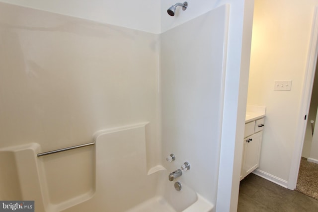 bathroom featuring vanity and shower / bathtub combination