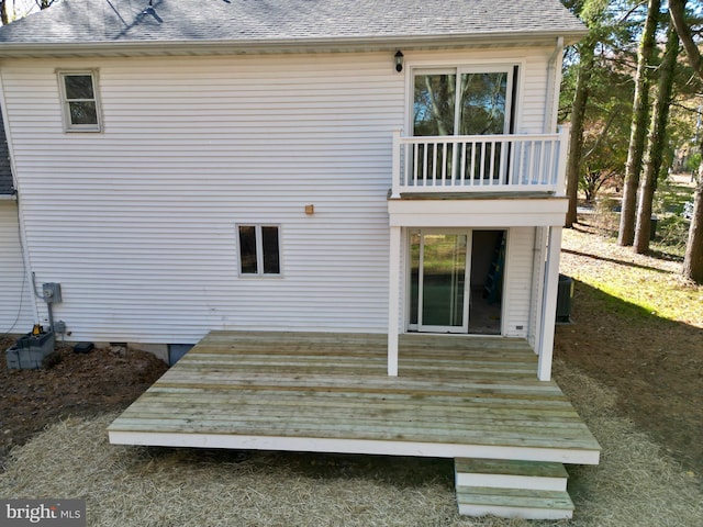 rear view of house with a balcony