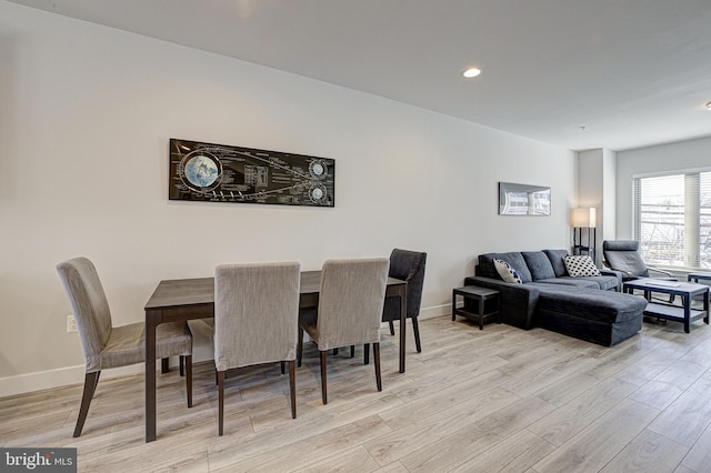 dining area with light wood-type flooring